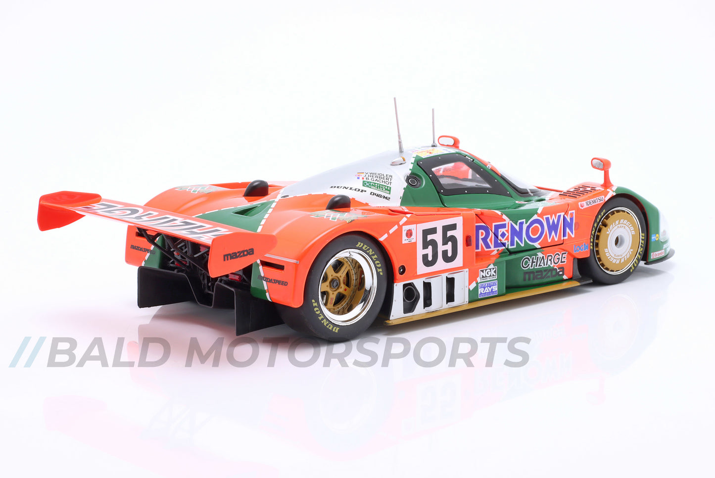 Produkt-Bundle bestehend aus Mazda 787B Sieger Le Mans 1991 im Maßstab 1:18 und den passenden Motorsportsocken