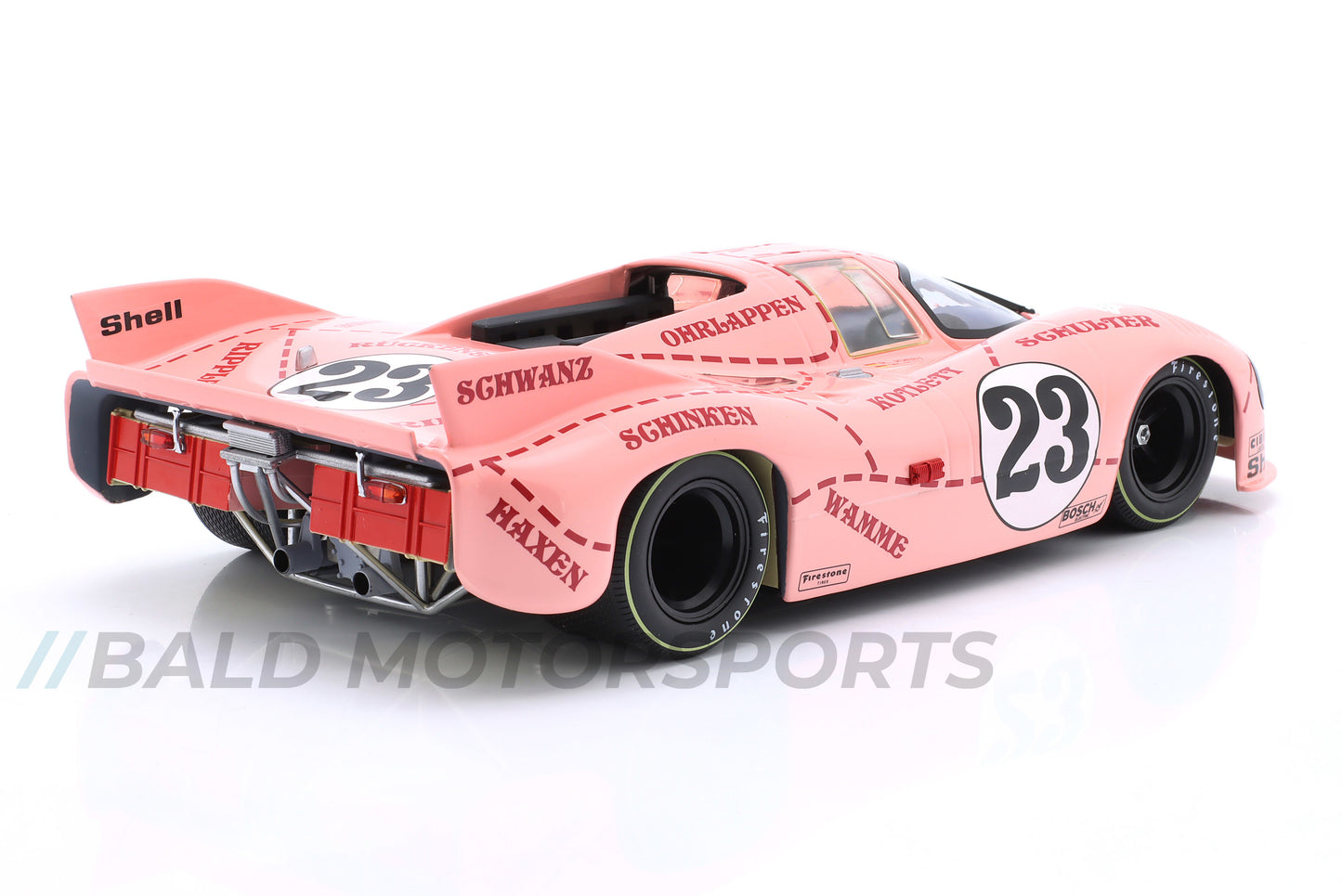 Produkt-Bundle bestehend aus Modellauto Porsche 917/20 "Pink Pig" 24h Le Mans 1971 im Maßstab 1:18 und dem passenden Thermobecher