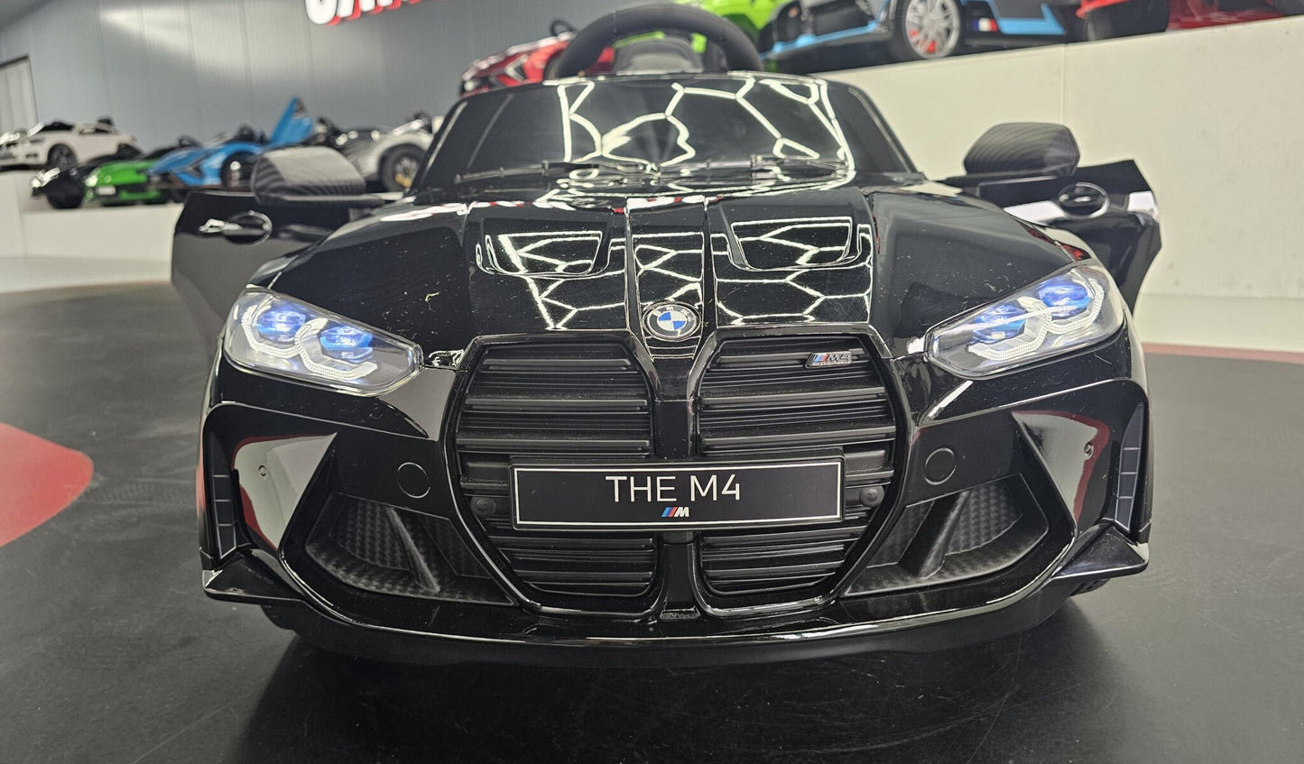 BMW M4 Kinderauto 12 Volt Schwarz Metallic mit Fernbedienung